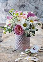 Bouquet of roses, snowberries, ox-eye daisies and 