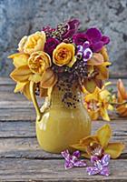 Bouquet of roses, orchids and elderberries