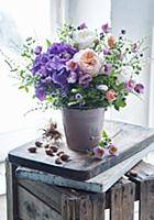 Bouquet of hydrangeas, roses and Japanese anemones