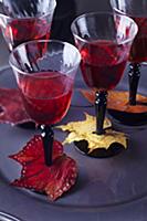 Wine glasses decorated with colourful, painted aut