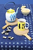 Table tennis bats used as coasters