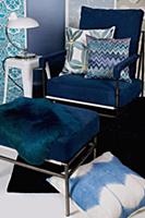 Armchair with blue upholstery, matching footstool 