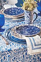 Table set in mixture of blue and white patterns