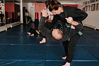 Couple practising martial arts in studio