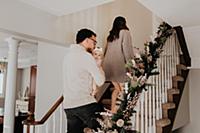 Family going upstairs to bed
