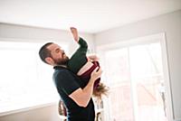 Father and son playing