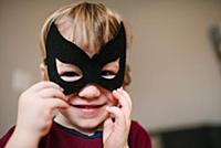 Boy in costume mask