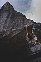Climber bouldering in forest, Squamish, Canada
