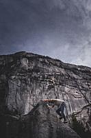 Climber bouldering in forest, Squamish, Canada