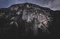 Climber bouldering in forest, Squamish, Canada