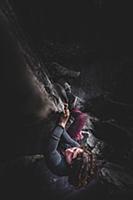 Climber bouldering in forest, Squamish, Canada