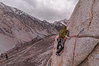 Climber trad climbing, Pine Creek, Bishop, Califor