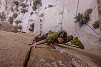 Climber trad climbing, Pine Creek, Bishop, Califor