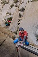 Climber trad climbing, Pine Creek, Bishop, Califor