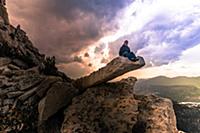 Climber resting on peak, Tuolumne Meadows, Yosemit