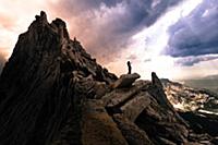Climber resting on peak, Tuolumne Meadows, Yosemit