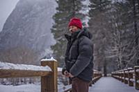 Climber on snow covered bridge, Yosemite National 