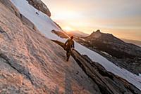 Climber enjoying view on peak, Tuolumne Meadows, Y