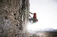 Climber trad climbing, Little Egypt, Bishop, Calif