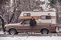 Climber beside campervan, Yosemite National Park, 
