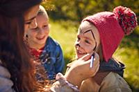 Girl getting face painted