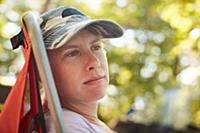 Woman relaxing on camp chair