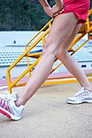 Close-up of woman performing stretching exercise