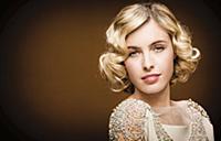 Portrait of beautiful blonde woman with 20's style