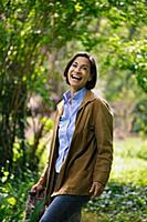 A laughing woman in a park