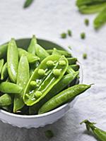 Fresh green peas in the bowl