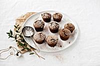 Chocolate muffins with powdered sugar