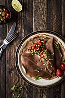 Cocoa pancakes with strawberry, basil and cucumber