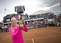 Sweden's Johanna Larsson celebrates with the troph