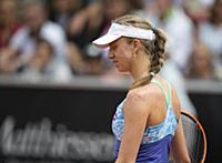 Mona Barthel of Germany returns a ball to Sweden's