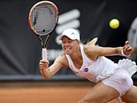 Sweden's Johanna Larsson returns a ball to Mona Ba