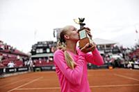 Sweden's Johanna Larsson kisses the trophy after w