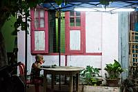 Myanmar / Mrauk U / 2014 / Burmese girl eating in 