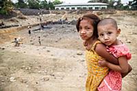 Myanmar / Mrauk U / 2014 / A community digging a h