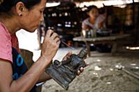 Myanmar / Mrauk U / 2014 / Burmese woman produces 