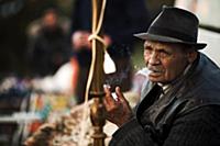 Romania / Negreni / 2014 / Seller takes a smoking 