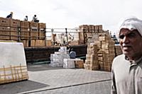 United Arab Emirates / Dubai / 2014 / Workers load