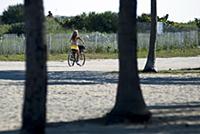 USA / Florida / Miami / 2009 / Girl bikes at Lummu
