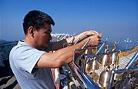 MYANMAR / Mon State / Little bells are offerings o