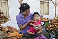 MYANMAR / Mon State / 2015 / Vendor with her daugh