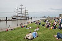 GERMANY / Bremerhaven / Visitors on the dike and K