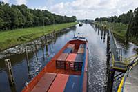 GERMANY / Lower Saxony / Barge leaving the lock ne