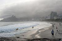 BRAZIL / Rio de Janeiro / Surfers at Arpoador beac