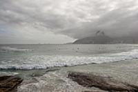 BRAZIL / Rio de Janeiro / Surfers at Arpoador beac