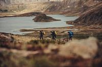 Hiker on a route through greenland, greenland, arc