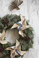 Wreath decorated with windmills made from yellowed